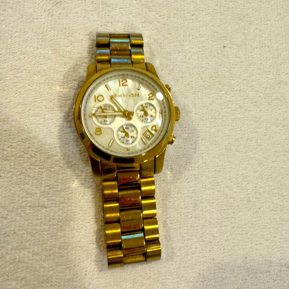 WORN Michael Kora gold watch
